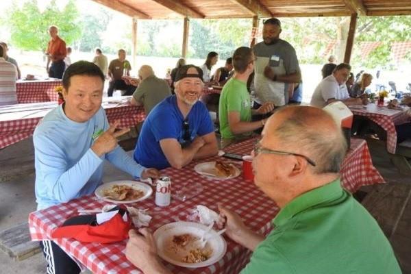 group of people eating at outdoor patio