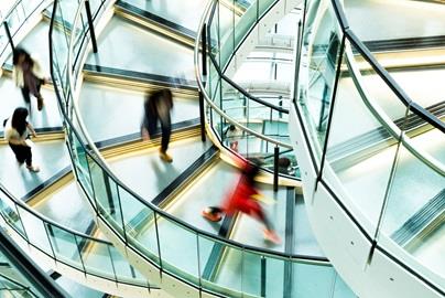 People walking on a spiral staircase