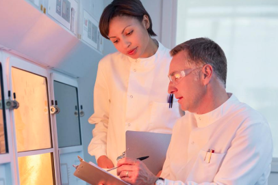 two employees discussing results