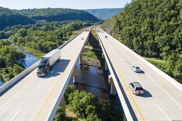 two highway roads over a creek 