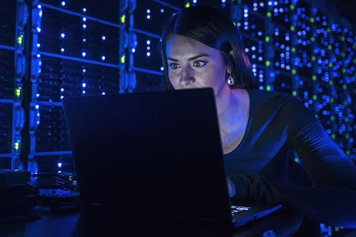 woman looking at laptop