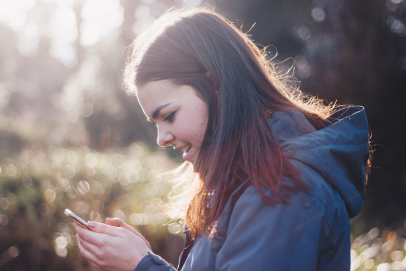 woman looking at phone