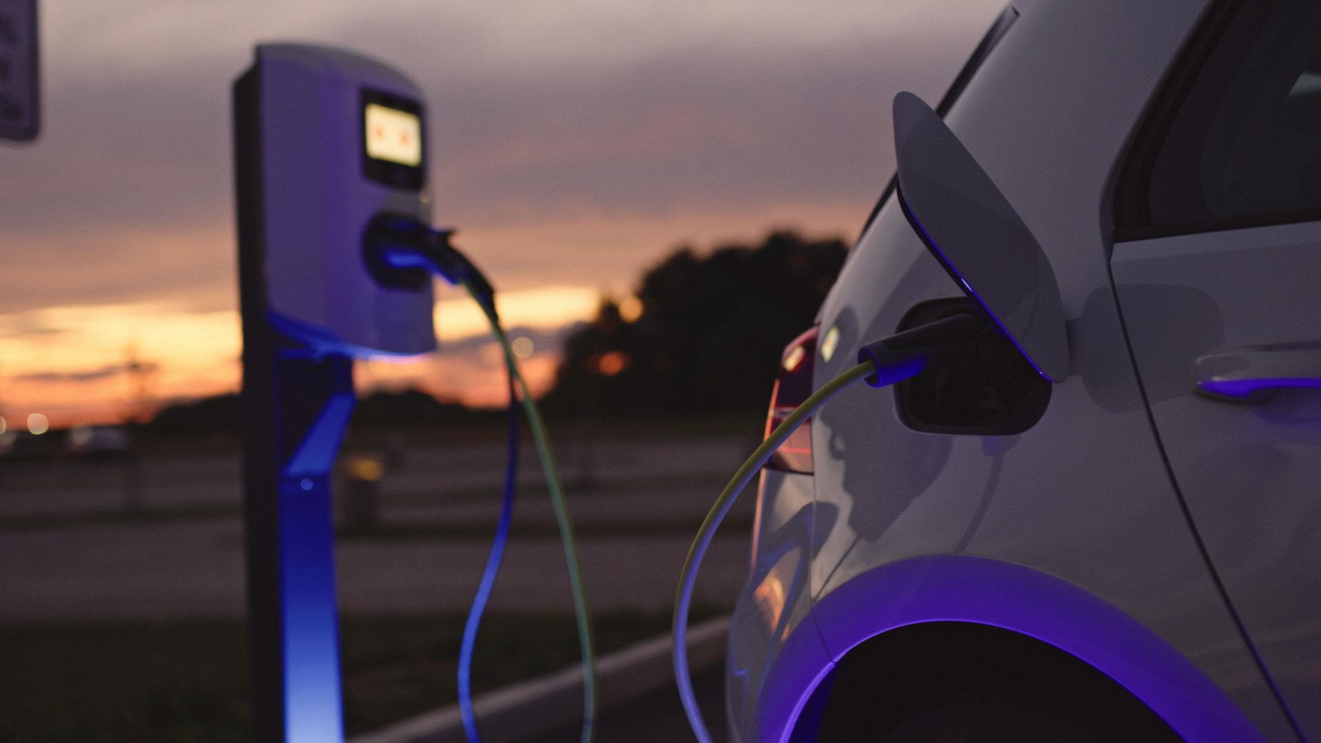 Car plugged into a charging station