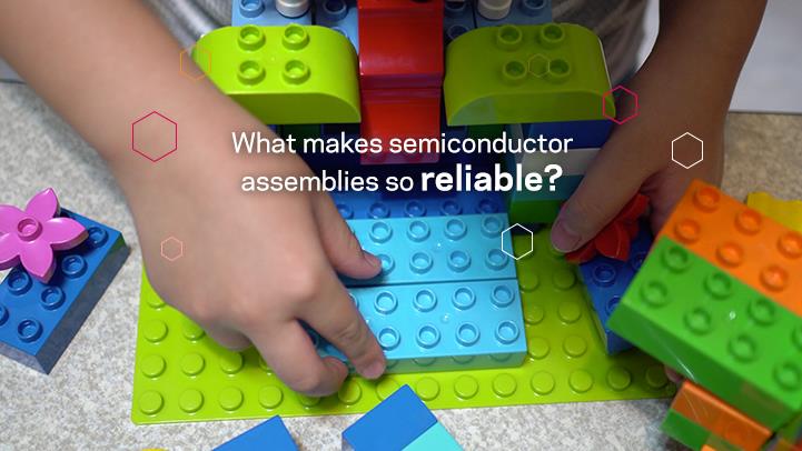 child placing playing blocks onto a board