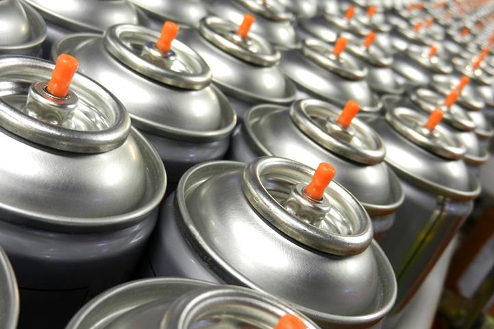large group of silver aerosol cans