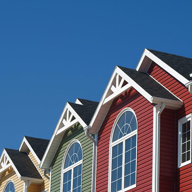 angle shot of brightly-colored townhouses